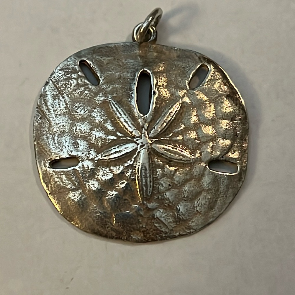 Epic!! Vintage large sand dollar pendant. James Avery sterling